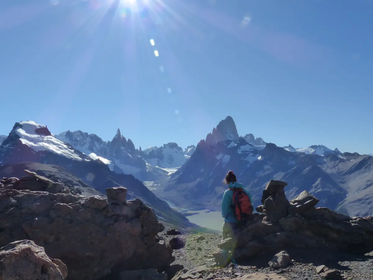 A rest on the rocks, facing the massif